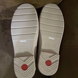 Nice short women Taupe colored size 7 rain boot.